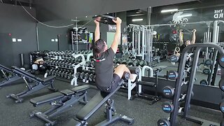 Decline Plate Overhead Situps