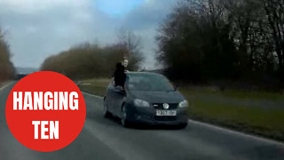 Off-duty prison officer hangs out of car window at 50mph