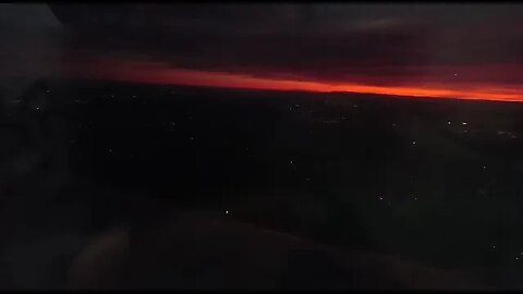 Sunset landing of A320 into Gatwick Airport, London, UK, Amazing view from the plane over wing.