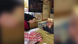 A Baby Girl Dances To The Beat With Her Mom
