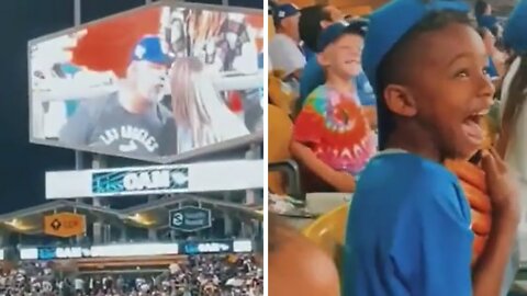 Kids' reaction to kiss camera at the baseball game is pretty hilarious
