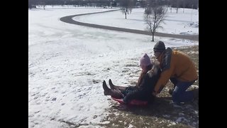 Dad Shows off his Sledding Moves