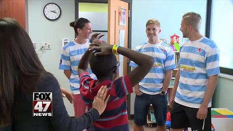 Lansing United players cheer up kids at Sparrow Children's Center