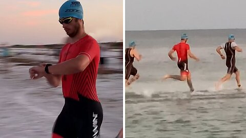 Triathlon athletes walk on water due to shallow swim conditions