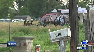 Neighbors in a Loveland neighborhood say several people are still living on a vacant property