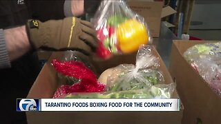 Tarantino Foods boxing food for the community