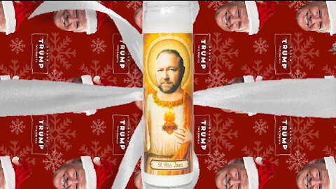 Perfect QAnon Gift: Alex Jones Prayer Candle Wrapped in Trump Christmas Paper