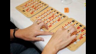 Neighbors play bingo while maintaining social distancing