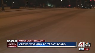 Crews working to treat sleet-covered roads