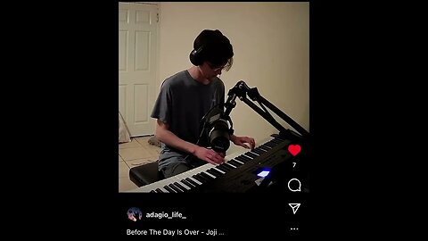 My son playing and singing his Music