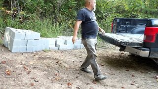 Getting the concrete block unloaded for the building.