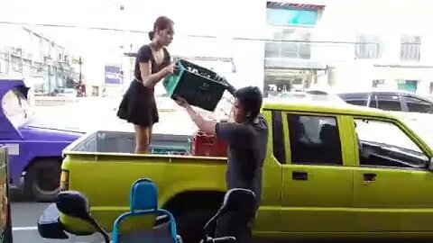 (PHILIPPINES) SEXY GIRL SLINGING BEER RACKS