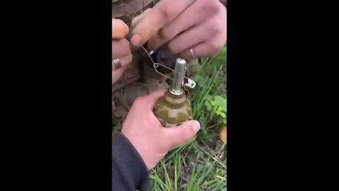 Ukrainian soldiers prepare booby traps to be placed in urban areas