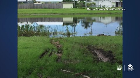 Man running from deputy dies after driving into pond in Stuart