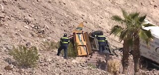 Tree-trimming truck rolls down cliff in Henderson