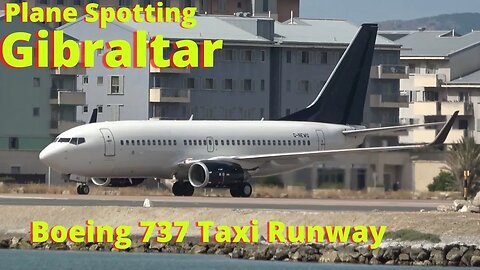 Boeing 737 Lands at Gibraltar and Taxis Down Runway, Boeing 737-76N