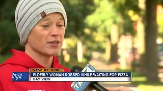Elderly woman robbed while waiting for pizza delivery