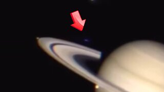 UFO passing through Saturn's rings