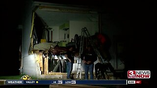 SUV crashes into West Omaha house