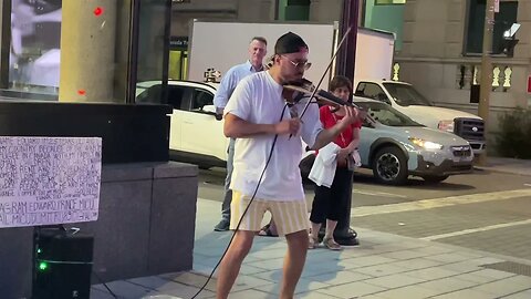 Random Street Performer Captivating Montreal's Breathtaking Street Performer