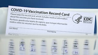 Experts Warn Against Sharing Vaccine Card On Social Media