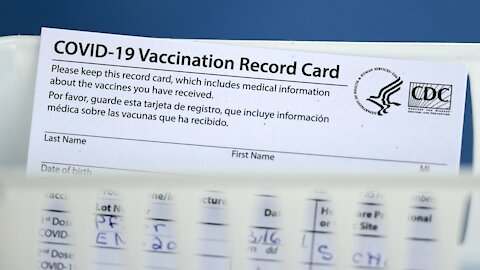 Experts Warn Against Sharing Vaccine Card On Social Media