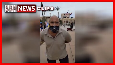 Leftist Lunatic Knocks a Phone Out of United States Marines Hand at the AZ State Capitol - 4019