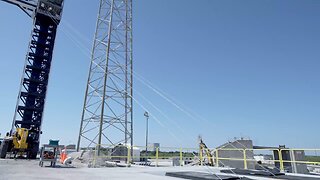 Teams test the emergency chutes from the pad 40 crew tower in Florida