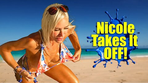 Nicole loses her top in the Med!