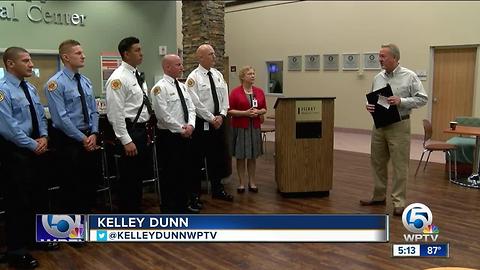 Paramedics honored for saving woman