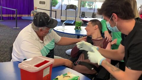 Families in adult care program receive first COVID-19 vaccine on St. Patrick's day