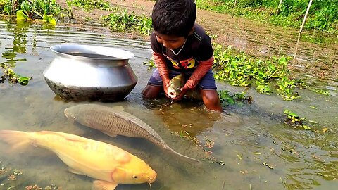 Child who catch big yellow fish 🐠