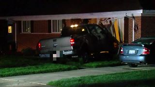 Truck slams into home in Farmington Hills