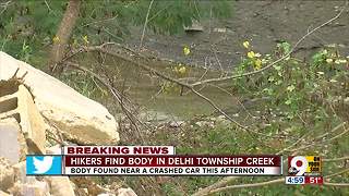 Hikers find body in Delhi Township creek