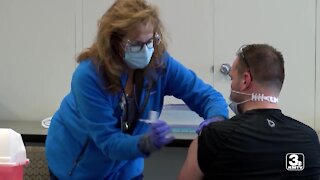 Coronavirus vaccine rollout hits six months