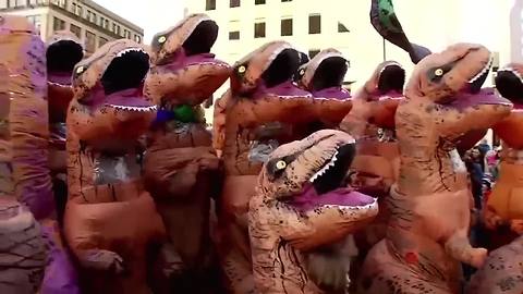 T-Rex takeover: Huge gathering of people in dinosaur costumes unite for party