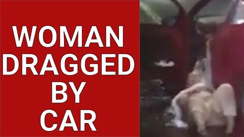 HORRIFIC . DRIVER DRAGS WOMAN