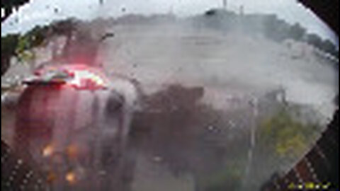 Surveillance video shows stolen car rolling, sliding across road after crash with MSP trooper