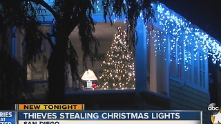 Thieves stealing Christmas lights