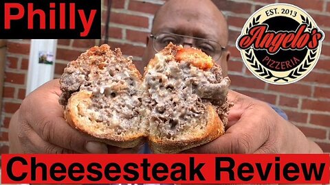 Eating A Philly Cheesesteak Sandwich From A Local Philadelphia Eatery Angelos Pizzeria