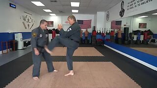 Executing the American Kenpo technique Obscure Sword