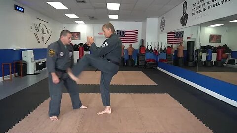 Executing the American Kenpo technique Obscure Sword