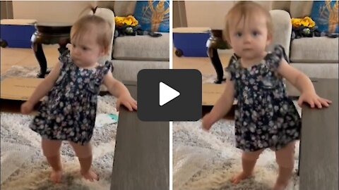 Baby girl preciously dances to 'Footloose' theme song