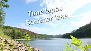 Time lapse - Summer lake with moving clouds - Relaxing music Moving On by Wayne Jones