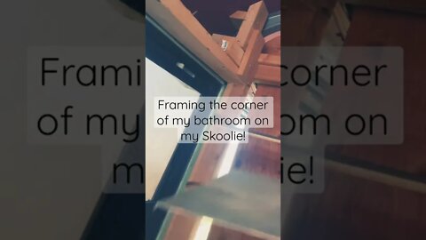 Framing the corner of the bathroom in my Skoolie,