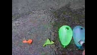 Green Laser vs. Water Balloons!