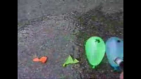 Green Laser vs. Water Balloons!