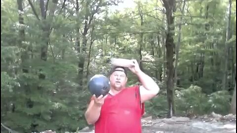 Breaking glass plates with bowling ball on my head!