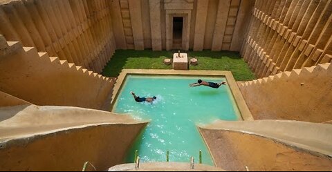 We built the world's most amazing water slide park villa underground