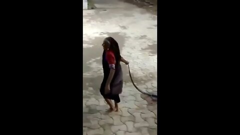 Old lady India yeets a cobra that wandered into her home